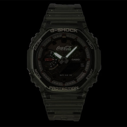 Montre homme Casio G-Shock Coca-Cola Collaboration, analogique-numérique, bracelet en résine biosourcée, cadran marron, mouvement à quartz GA-2100CC-3A, étanche à 200 m